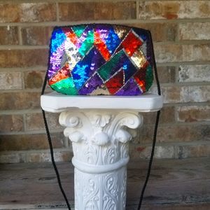 Multicolored sequined clutch.